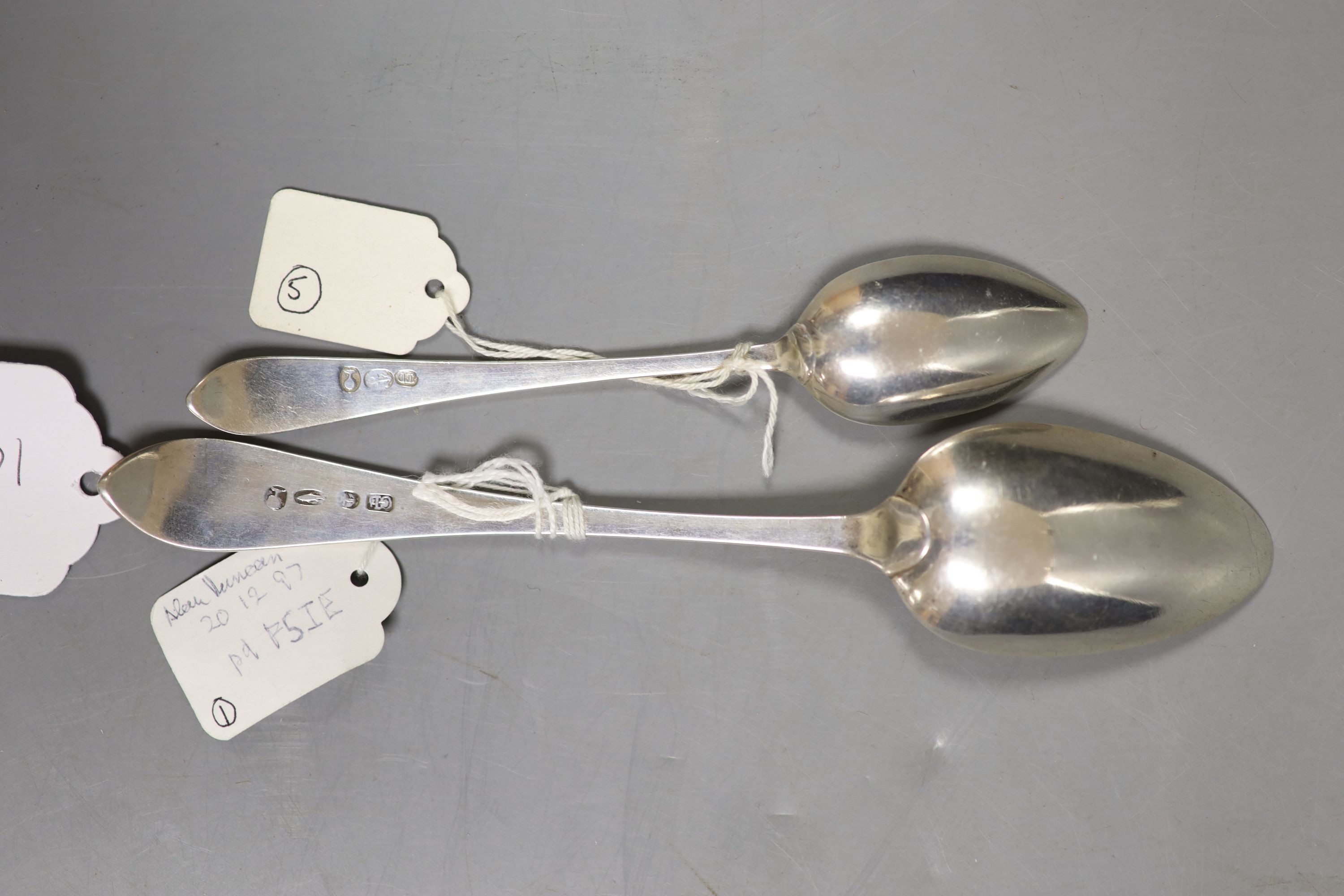 An early 19th century Scottish provincial silver dessert spoon by George Buchanon, Greenock, c.1835, 18cm and a similar teaspoon, Thomas Davie, c.1800, gross 47 grams.